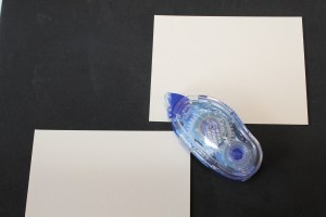 Ad adhesive to two of the four 4" x 5 1/4" pieces